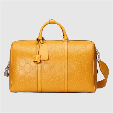 gucci gg embossed duffle bag|genuine gucci duffle bags.